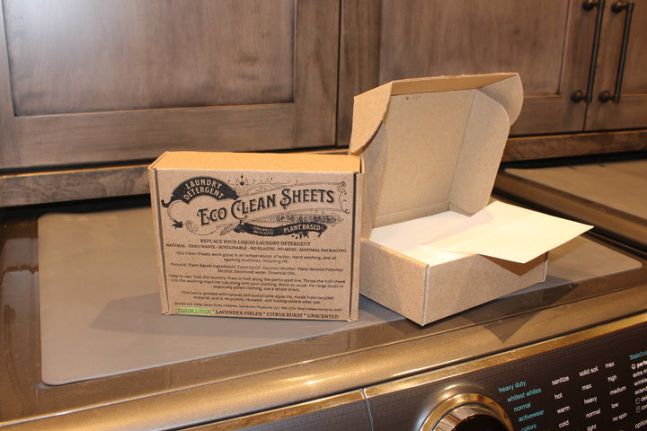 Box of Eco Clean Sheets on a kitchen counter with wooden cabinets in the background