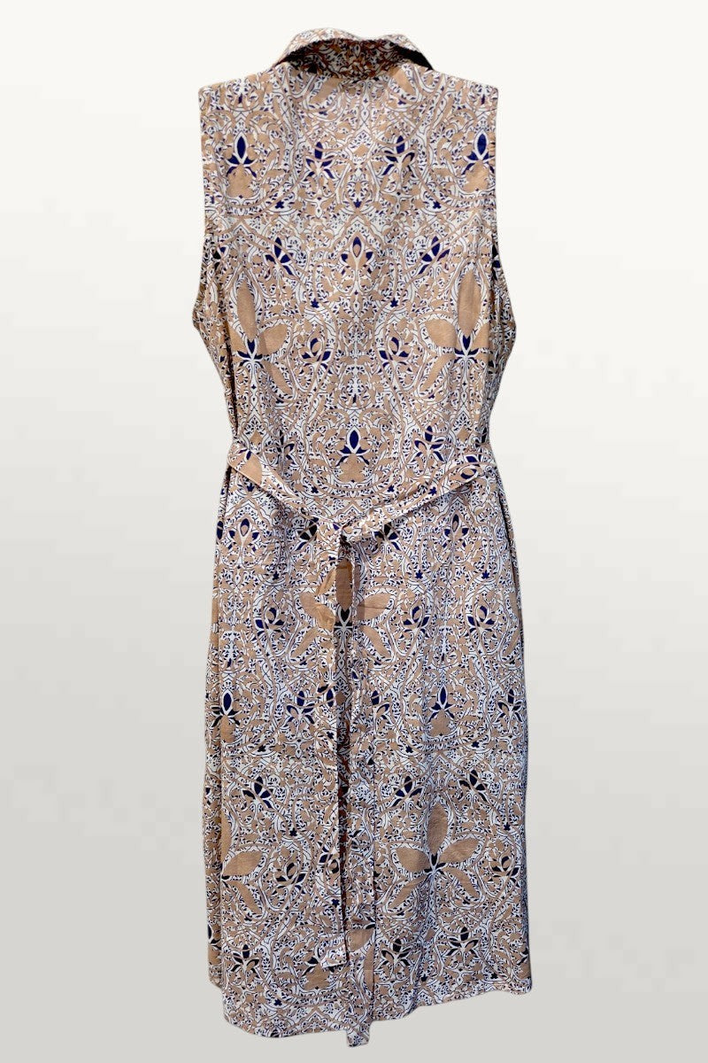 Natural Clothing Company sleeveless cotton summer dress in a tan and navy blue intricate print with a fabric belt.